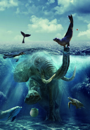 Ristlõige ookeani põhjani. Ookeani põhjas kõnnib elevant, kes kannab londi otsas hüljest, ümberringi erinevad kilpkonnad, kalad ja muu mereloomad